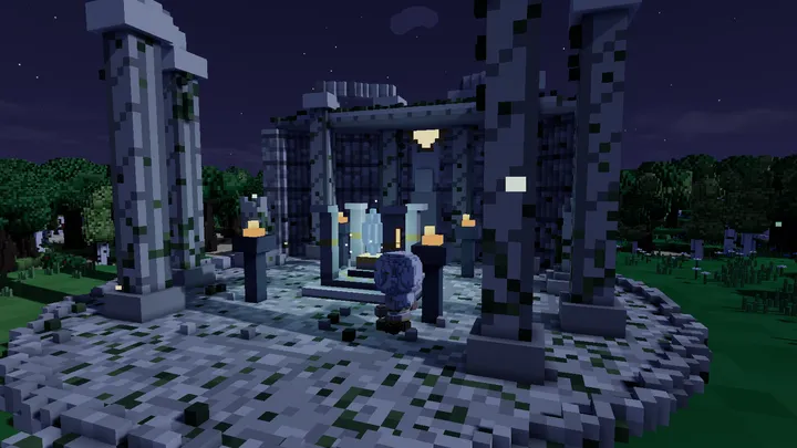 The temple's braziers burning at night